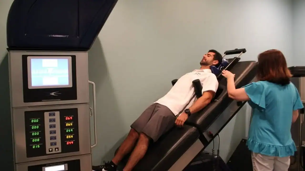 DRX9000 spinal decompression table at Strand Spine Institute